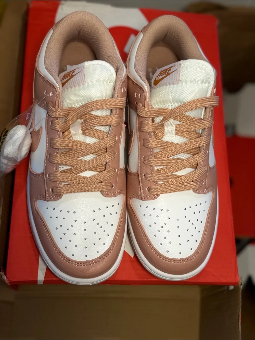 Nike Women’s Low-Top Sneakers in Blush Pink and White